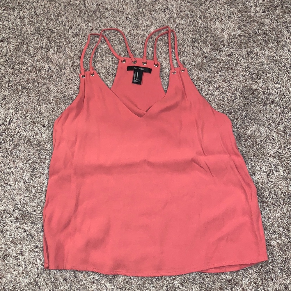 Coral top, in good condition, size M